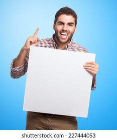 Portrait Of A Young Man Holding A Placard