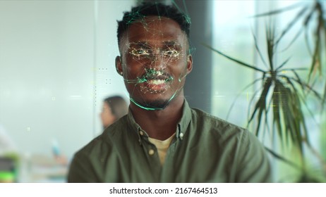 Portrait Of Young Man Looking At Camera And Hi-tech Detection Face. Data Analyzing Animation With Points. Biometric Facial Recognition.