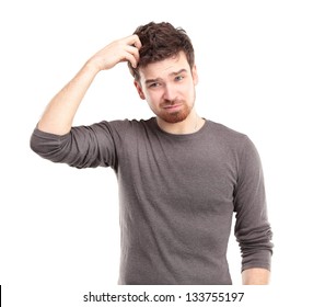 Portrait Of Young Man Looking Perplexed