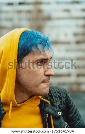 Similar – Man with gray hair and yellow turban.