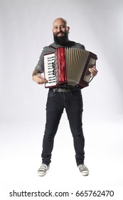 Portrait Of Young Man Playing Accordian 