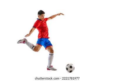 Portrait of young man, professional football player in motion, training, dribbling ball isolated over white studio background. Concept of sport, team game, action, motion. Copy space for ad, poster - Powered by Shutterstock