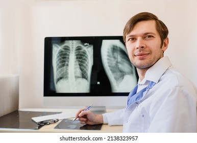 Portrait Of A Young Man Radiologist In His Interpretation Room.