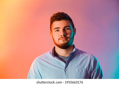 Portrait Of Young Man In The Red And Blue Neon Light