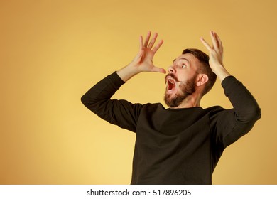 Portrait Of Young Man With Shocked Facial Expression