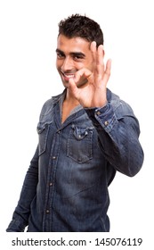 Portrait Of A Young Man Showing Ok Sign