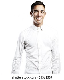 Portrait Of Young Man Smiling Against A White Background