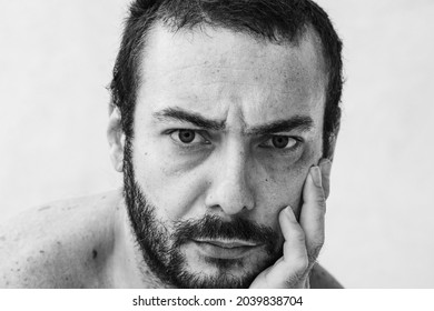 Portrait Young Man With Stressed Face. 30 Year Old Man Monochrome Portrait