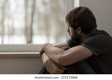 Portrait of young man suffering for depression