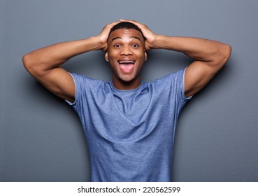 Portrait Of A Young Man With Surprised Expression On Face