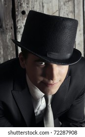 Portrait of a  young man in top hat