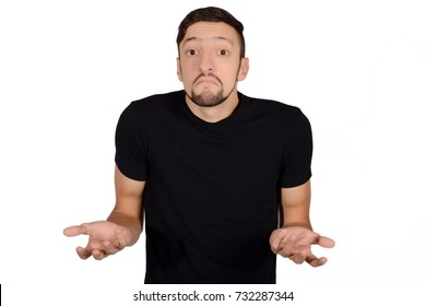 Portrait Of A Young Man Who Do Not Understand What Is Happening. Isolated White Background.