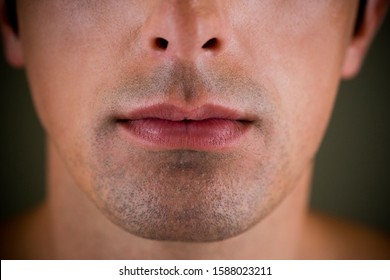 Portrait Of A Young Man's Mouth And Jaw Line