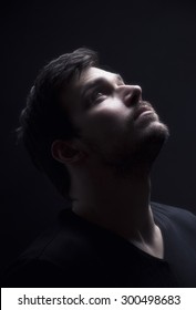 Portrait Of A Young Men Looking Up, In Sci Fi Atmosphere. Soft Focus Intentional.