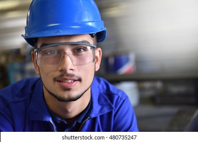 Portrait Of Young Metalwork Trainee In Workshop