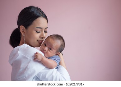 Portrait Young Mother Holding Her Newborn Child Mom Nursing Baby Mom And Baby Boy Portrait Young Mother Holding Her Newborn Child Mom Nursing Baby Mom And Baby Boy
