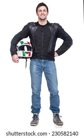 Portrait Of A Young Motorcyclist Is Holding A Helmet Posing Isolated On White Background.