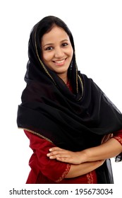 Portrait Of Young Muslim Woman Against White Background