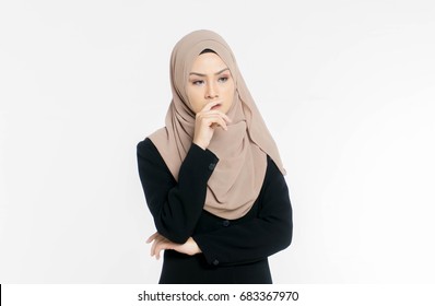 Portrait Of A Young Muslim Woman Dressed In Office Is Thinking