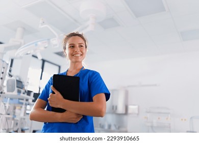 Portrait of young nurse in surgical department. - Shutterstock ID 2293910665