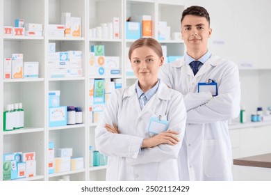 Portrait of young pharmacists at pharmacy - Powered by Shutterstock