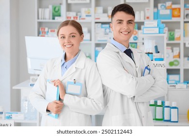 Portrait of young pharmacists at pharmacy - Powered by Shutterstock