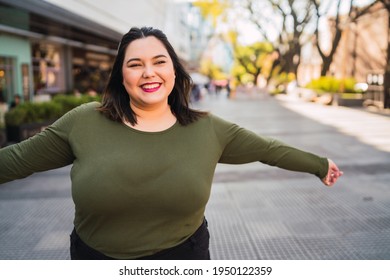 Portrait of young plus size woman. - Shutterstock ID 1950122359