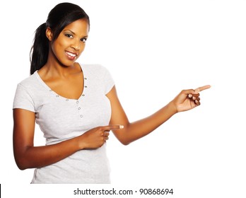 Portrait Of A Young Pretty Black Woman Pointing With The Fingers.