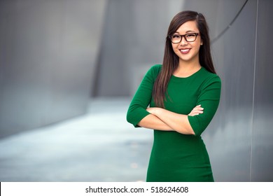 Portrait Of A Young Professional Business Woman Staff Leader Confident With Arms Folded