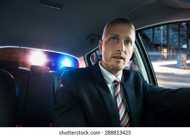 Portrait Of A Young Scared Man Pulled Over By Police