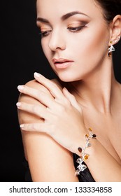 Portrait Of Young Sexy Woman With Bracelet