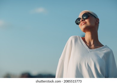 Portrait Of Young Smiling Millenial European Short Haired Woman In Sunglasses. Beautiful Happy Blonde Girl Outdoor. Summer Fashion Female Clothing.