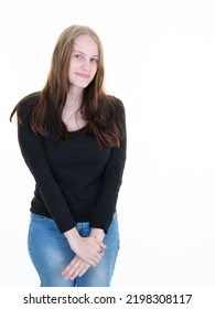 Portrait Of Young Smiling Shy Woman Blonde Looks In Camera