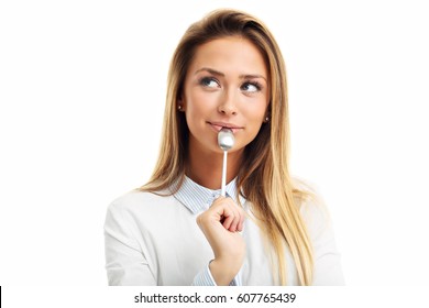 Portrait Of Young Smiling Woman With Spoon In Her Mouth Isolated On White