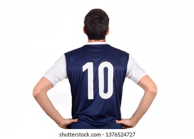 Portrait Of Young Soccer Player Back On White Background. Sport Concept.