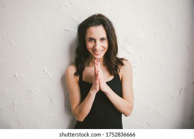 Portrait Of Young Sports Woman Of Athletic Build In Swimsuit. Woman Spend Time In A Dance Studio. Beauty Woman In Sport Wear Stand On Wall. Bodysuit Posing On Wall Background. Girl With No Makeup.