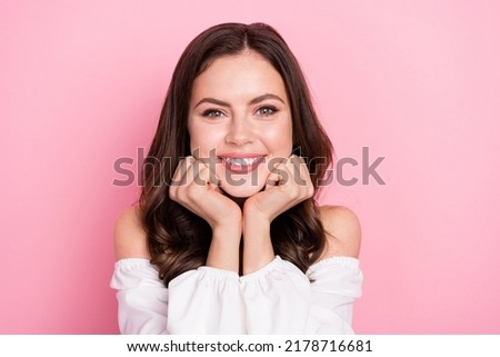 Portrait of young stunning good mood beaming lady relaxing summer holidays isolated on pink color background