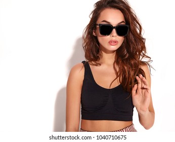 Portrait of young stylish girl model in casual summer clothes  with natural makeup in sunglasses isolated on white background
