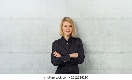 Portrait of young successful, strong business woman