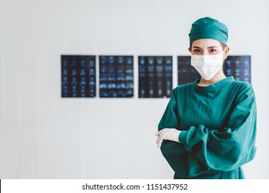 Portrait Young Surgeon Asian Doctor Over Radiography Background, , Asian Medical Concept