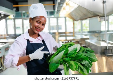 Portrait Young Teen Girl Cook Student. Cooking Class. Culinary Classroom. Happy Young African Woman Students Holding Fresh Vegetables For Cooking In Cooking School. 