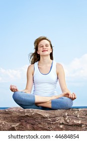 Portrait Of Young Teenage Girl Practicing Yoga Outside