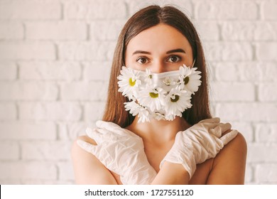 Portrait Young Tender Woman Posing In Summer Medical Face Mask And Latex Protective Gloves. Happy Beautiful Girl Wearing Protective Mask With Daisy Flowers. Natural Female Beauty. COVID-19 Quarantine