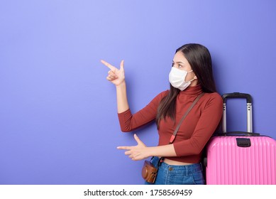 Portrait Of Young Traveler Woman With Face Mask , New Normal Travel Concept 