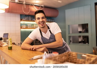 Portrait of young waiter.He standing in his bar and looking at camera.	
 - Powered by Shutterstock