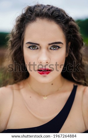 Similar – Portrait of girl in red dress