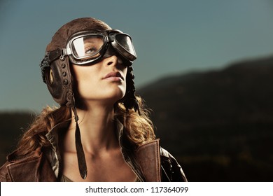 Portrait Of Young Woman Airplane Pilot