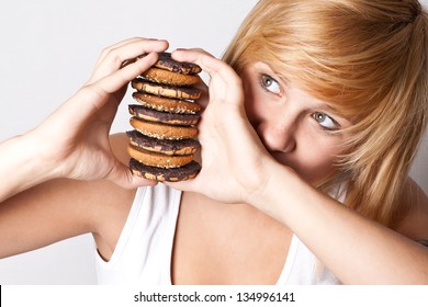 Portrait Of Young Woman With Chocolate Chip Cookies