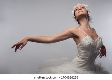 Portrait of young woman classical dancer. Ballerina Choreography. Ballet Swan Lake.