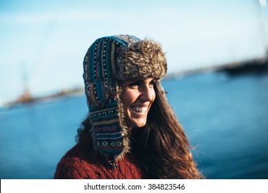 https://image.shutterstock.com/image-photo/portrait-young-woman-hat-standing-260nw-384823546.jpg